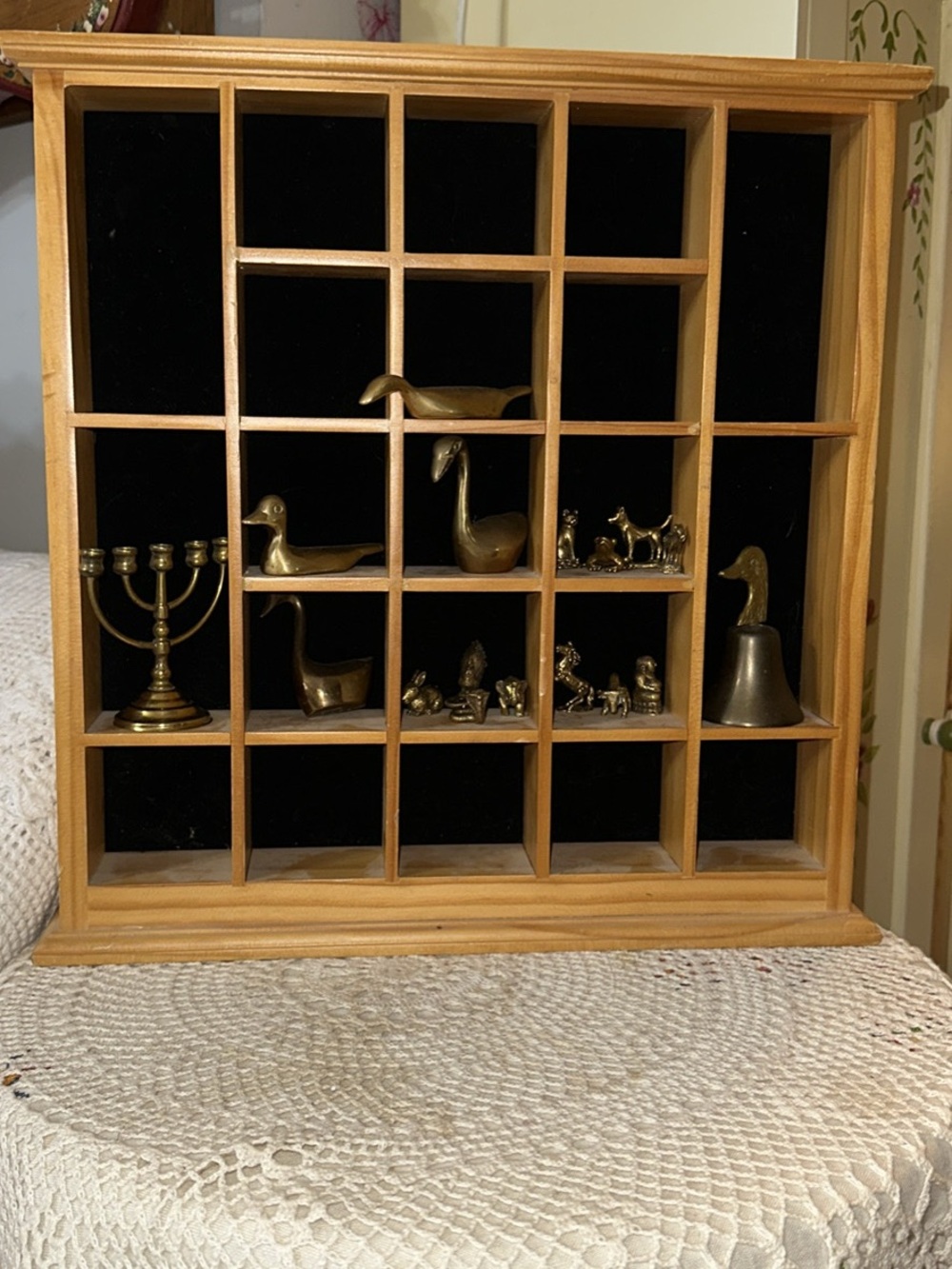 Wooden Grid Display Shelf Wall Decor in Natural Pine &brass figurines